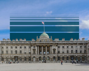 A scenic view of the famous Somerset House in London under a wispy sky